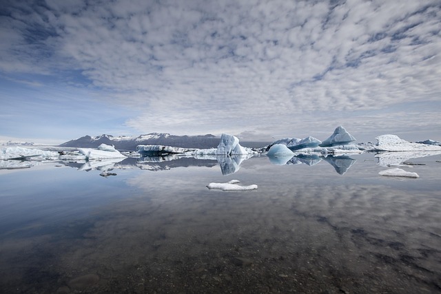Jokulsarlon glacier lagoon with aurora in background