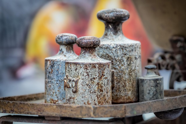 Glass of water next to a scale, representing hydration and weight