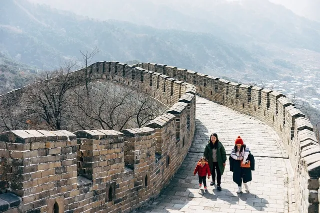 The Great Wall of China snaking through autumn foliage